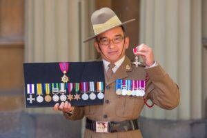 Khadak with his grandfather’s MBE